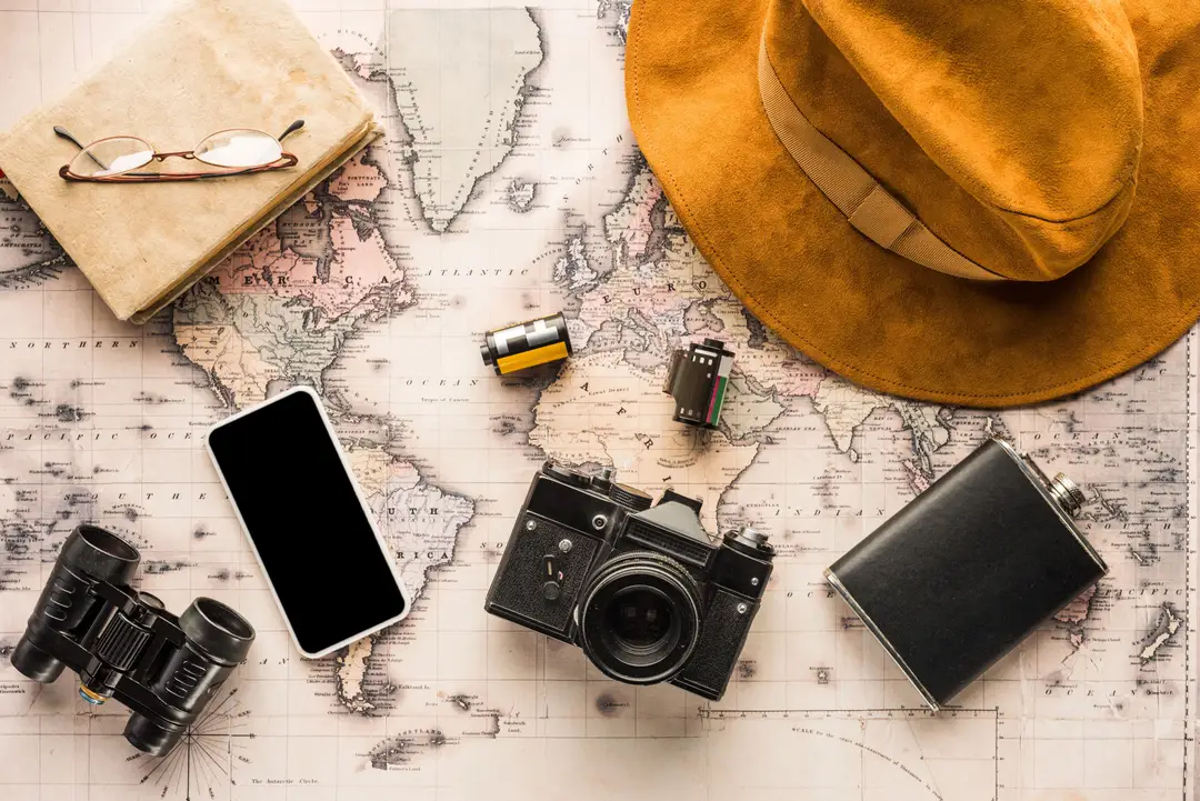 top-view-of-traveller-attributes-on-vintage-map-2024-11-19-07-45-06-utc (1).jpg