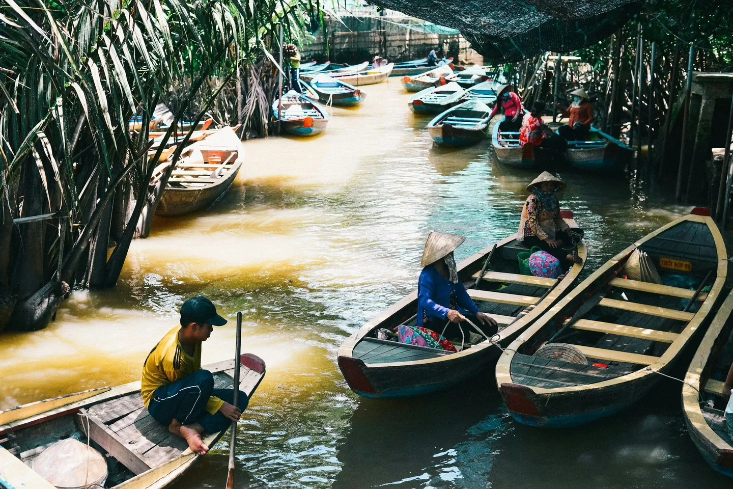 vietnam mekong boat people -unsplash.jpg