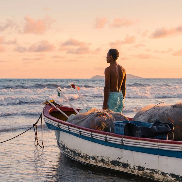 Voyage en Chine - coucher de soleil et pêcheur à Sanya