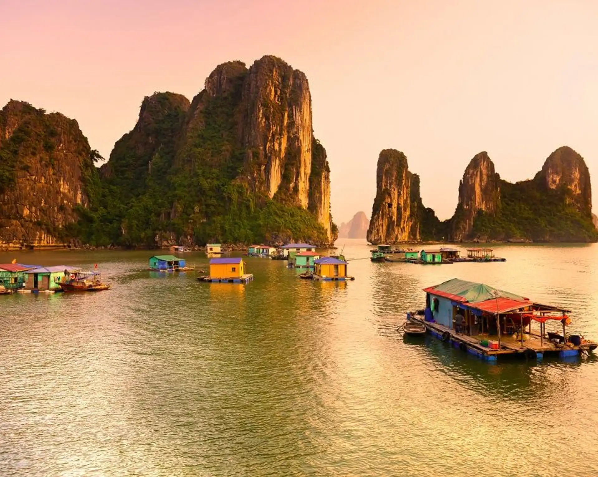 Travel in Asia - A floating village at sunset in Ha Long Bay