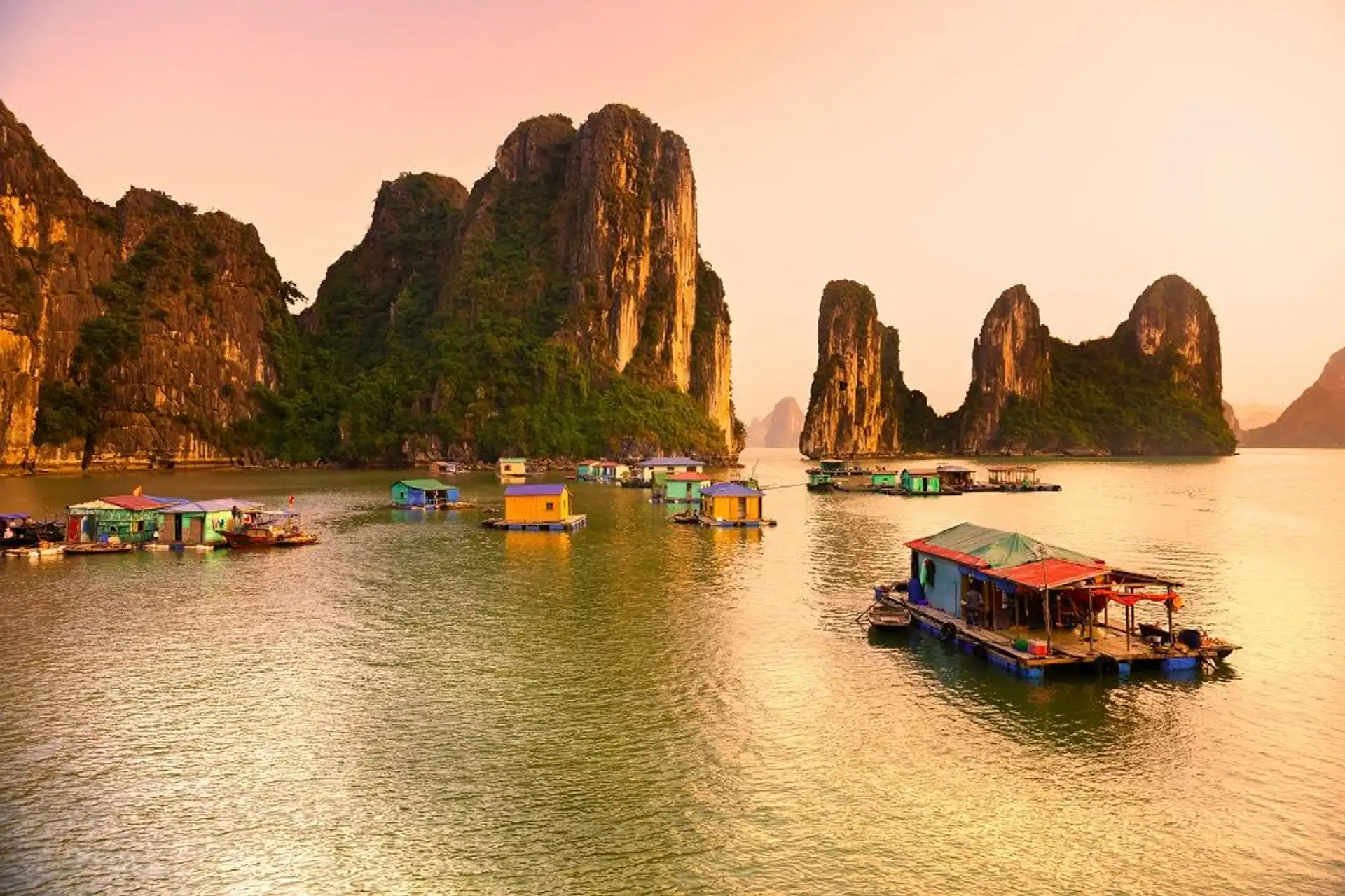 Travel in Asia - A floating village at sunset in Ha Long Bay