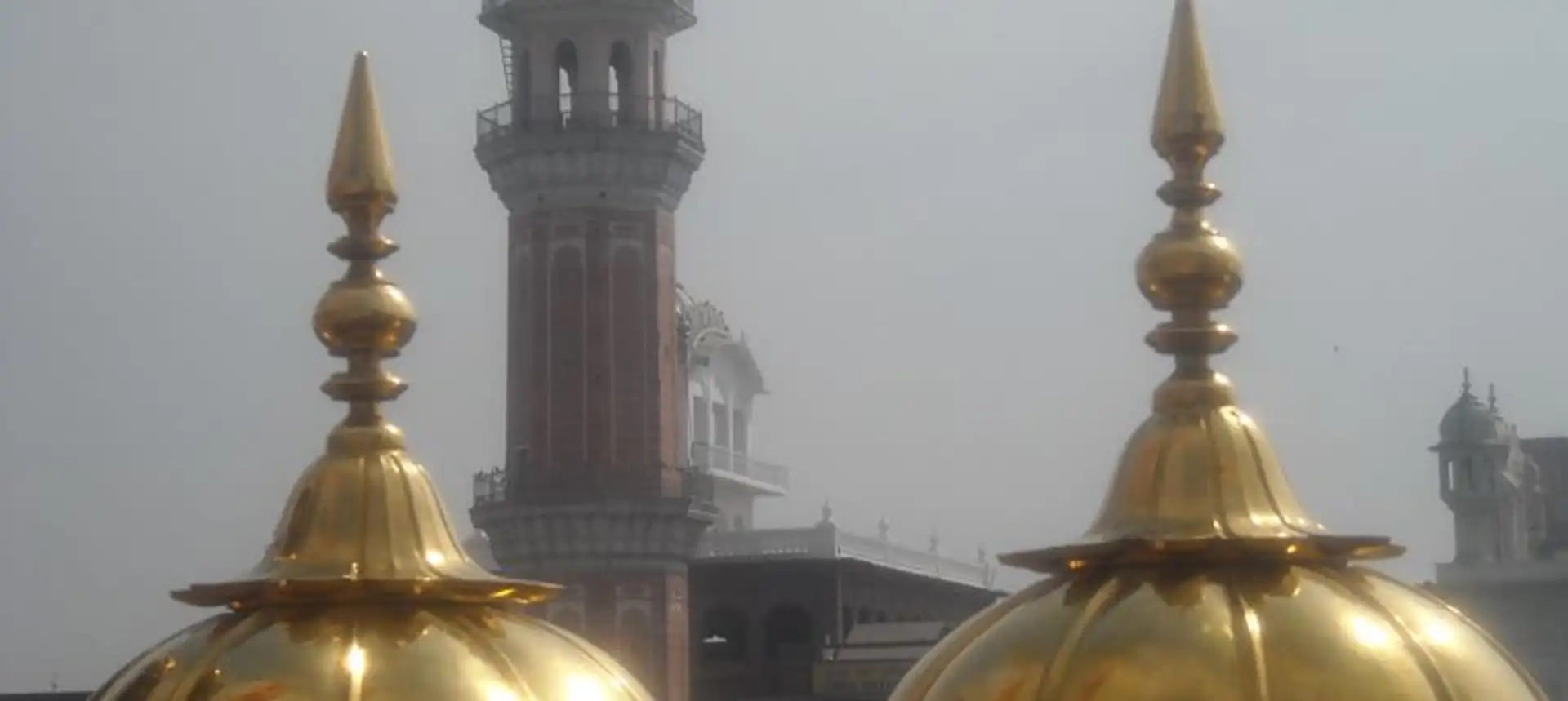 Travel in Asia - Golden domes of the Sri Harmandir Sahib, also known as the Golden Temple, in Amritsar, Punjab, India