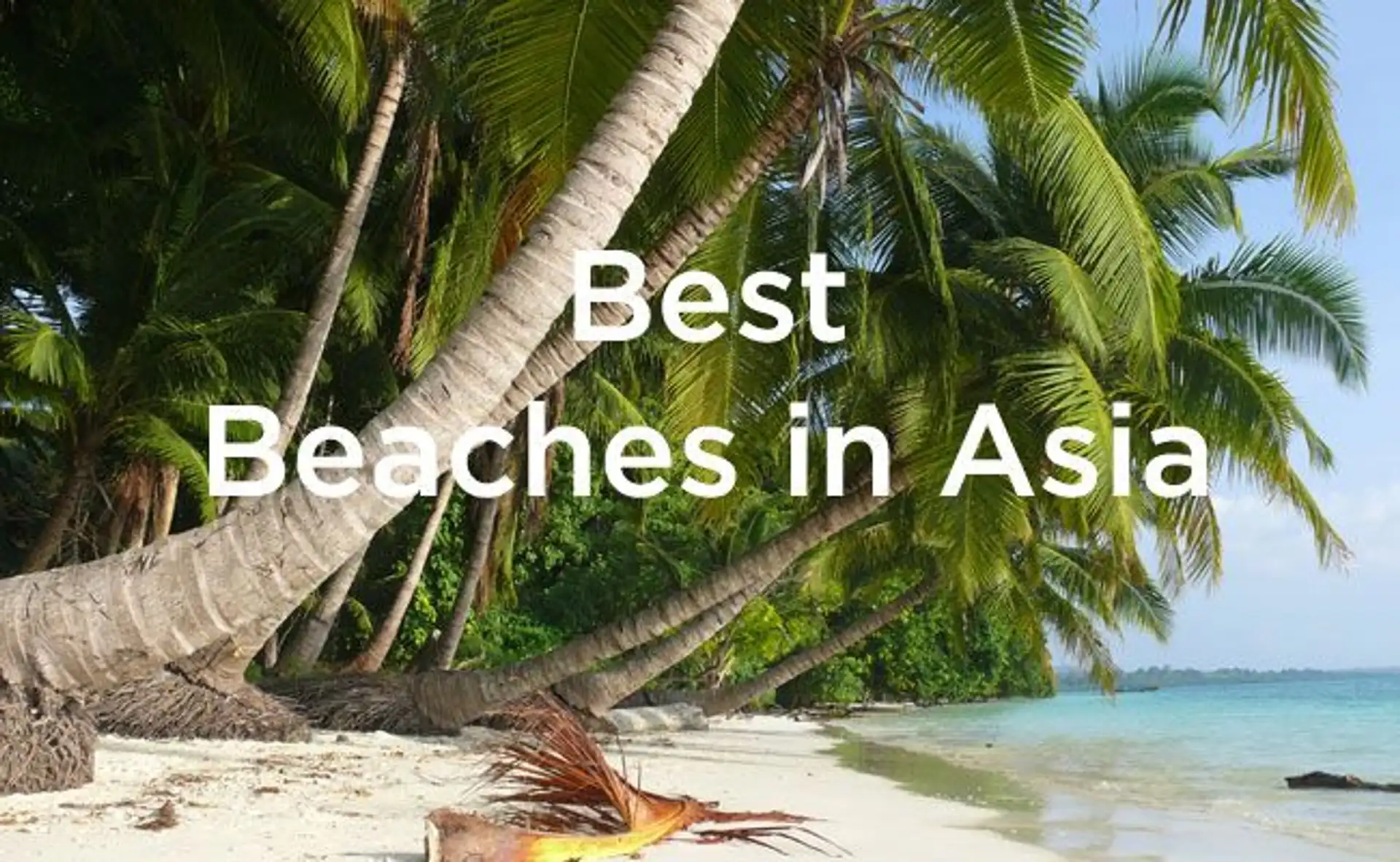 Travel in Asia - A tropical white-sand beach with palm trees, overlaid with the text "Best Beaches in Asia"