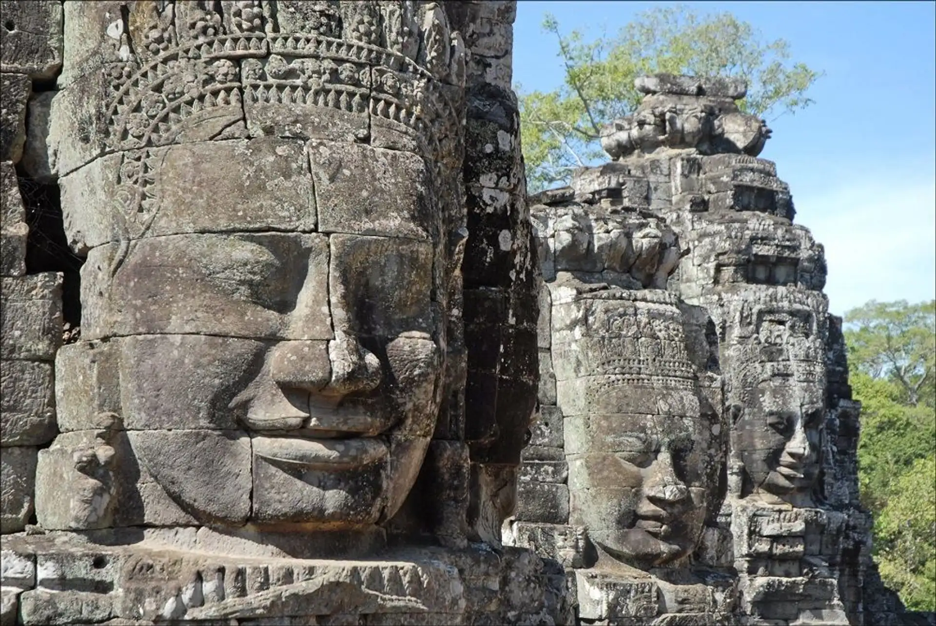 Travel in Asia - Giant stone faces of the Bayon Temple in Angkor Thom, Cambodia
