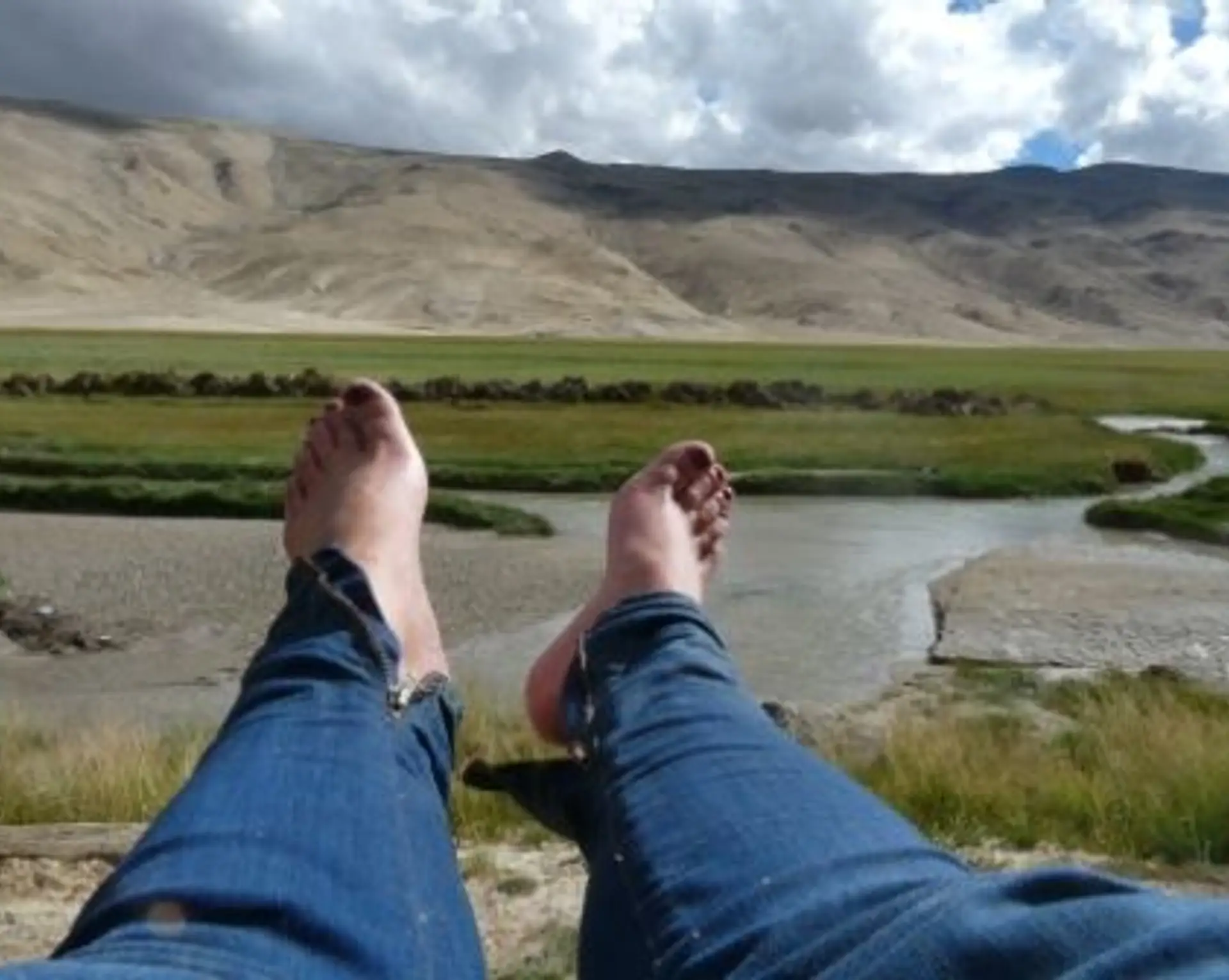 Travel in Asia - Man resting along a trek in Ladakh