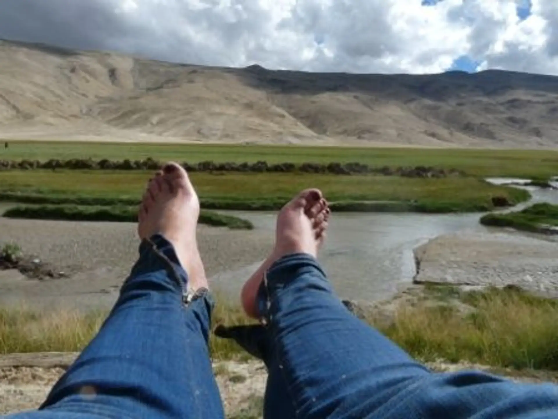 Travel in Asia - Man resting along a trek in Ladakh