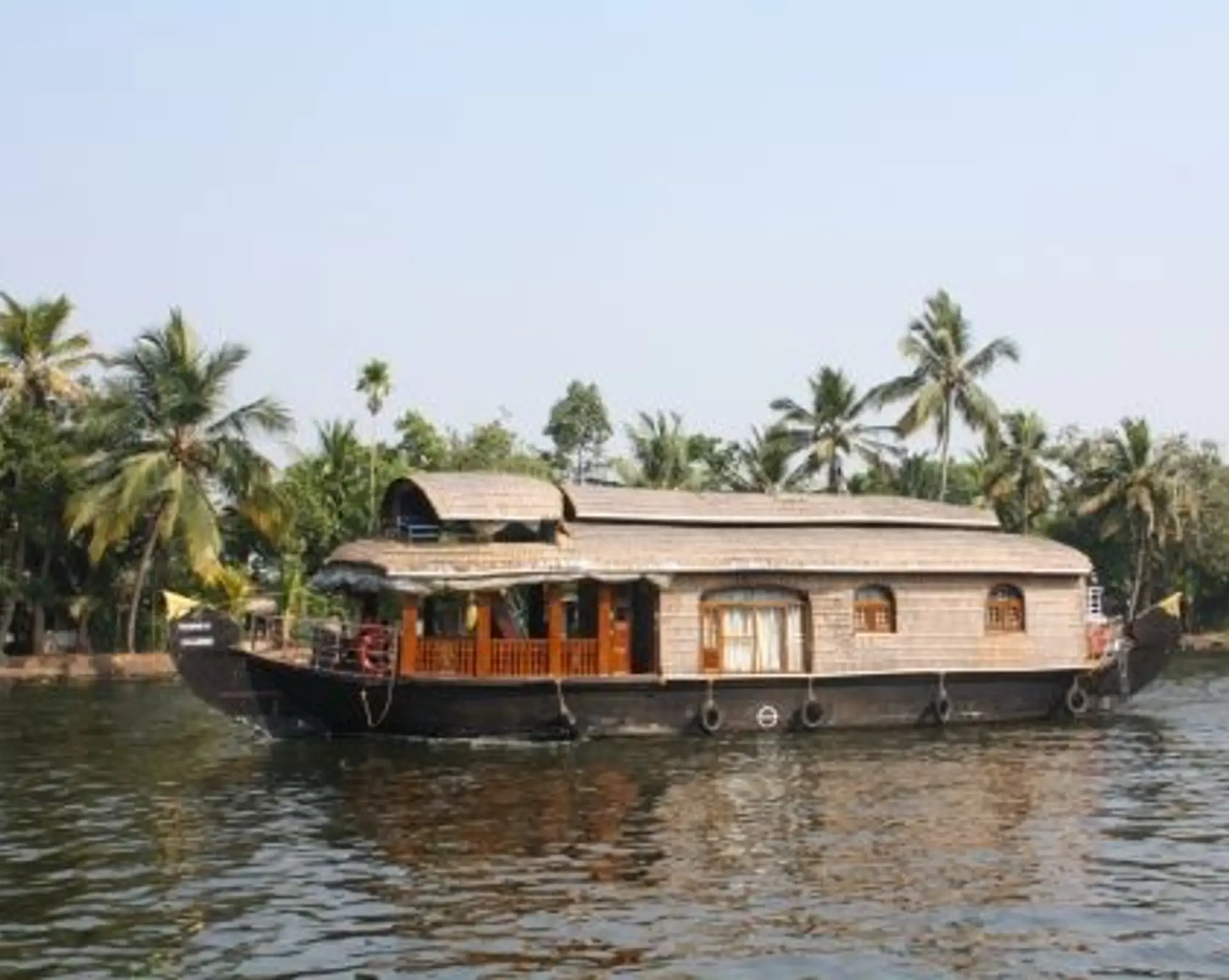 Travel in Asia - A houseboat floating on the backwaters of Kerala, India