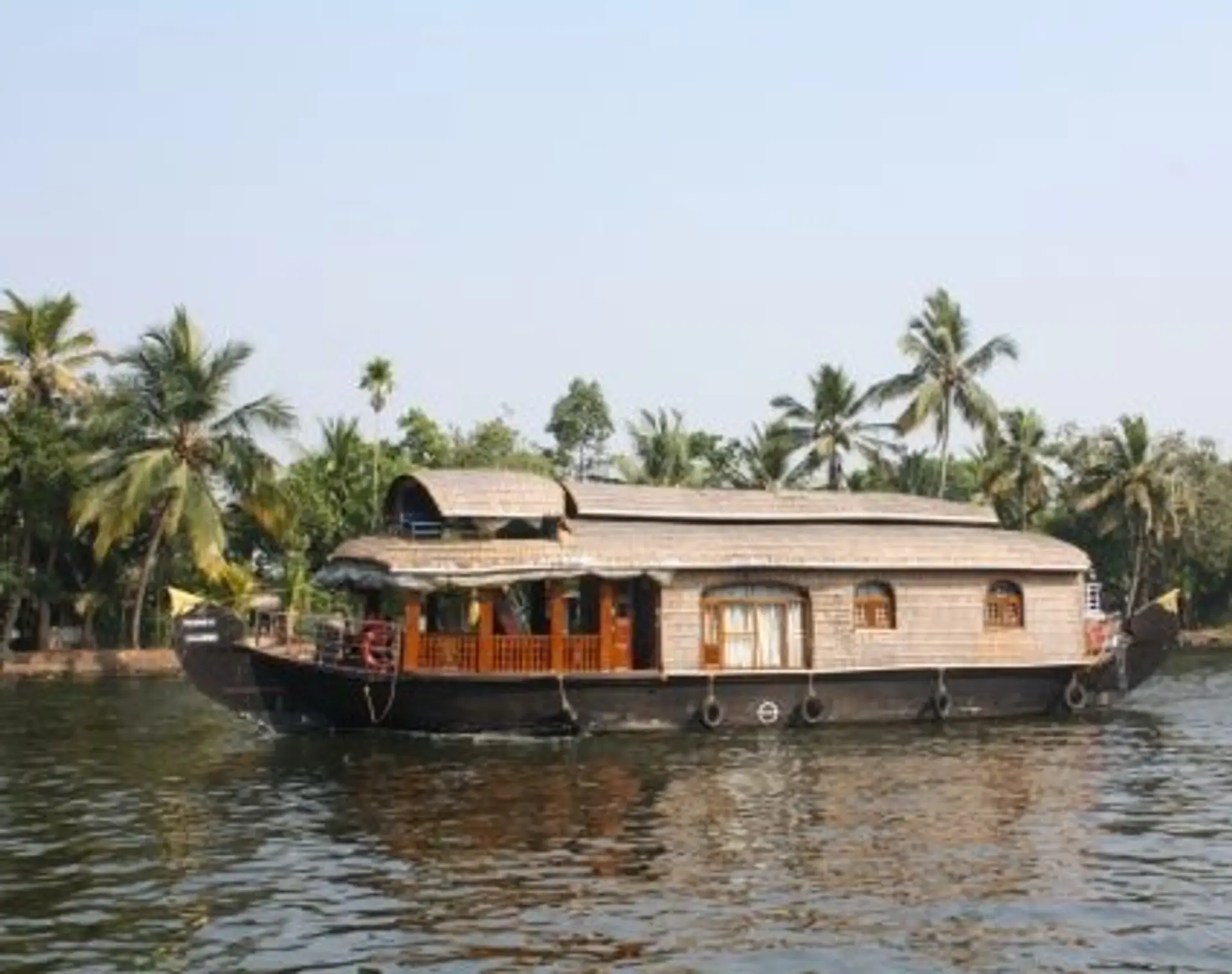Travel in Asia - A houseboat floating on the backwaters of Kerala, India