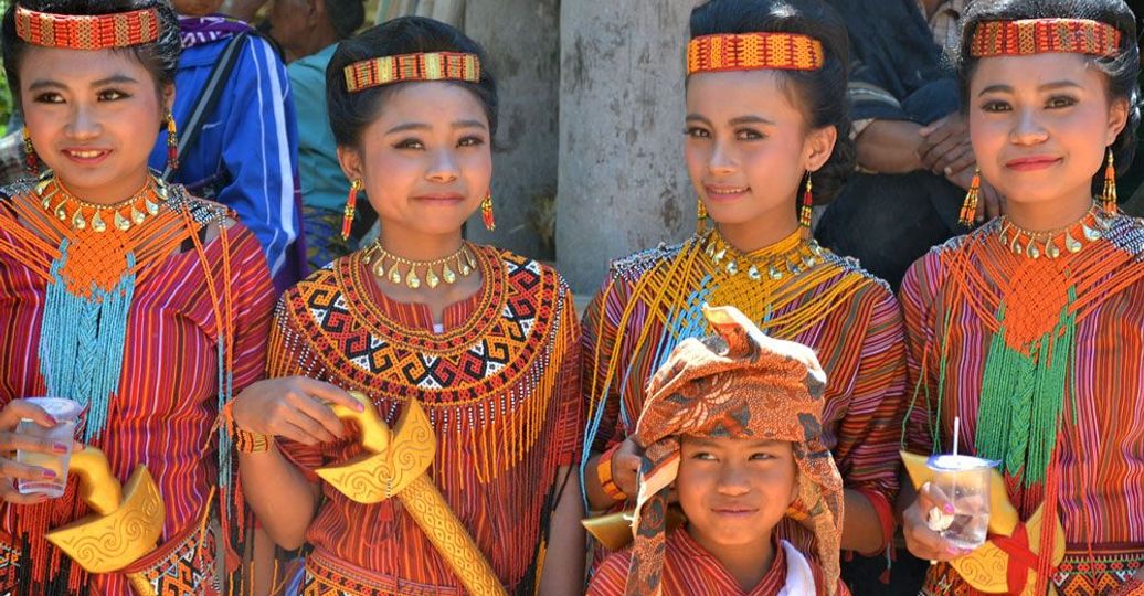 Travel in Asia - Members of the Toraja ethnic group in Sulawesi, Indonesia, wearing traditional attire