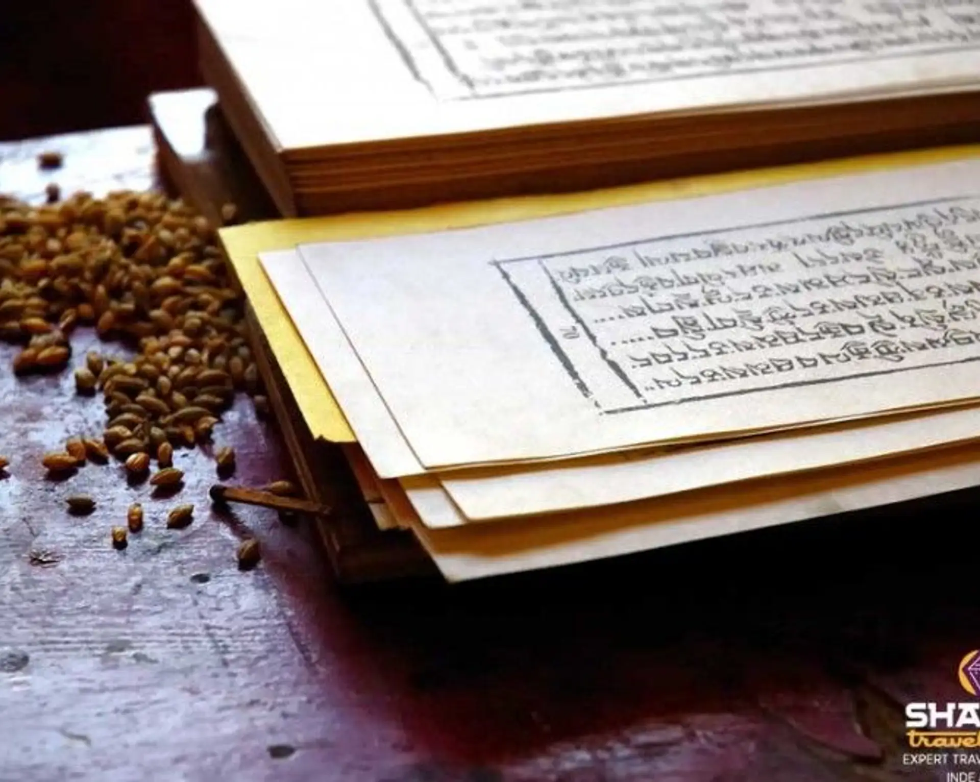 Travel in Asia - A Tibetan prayer book open on a table