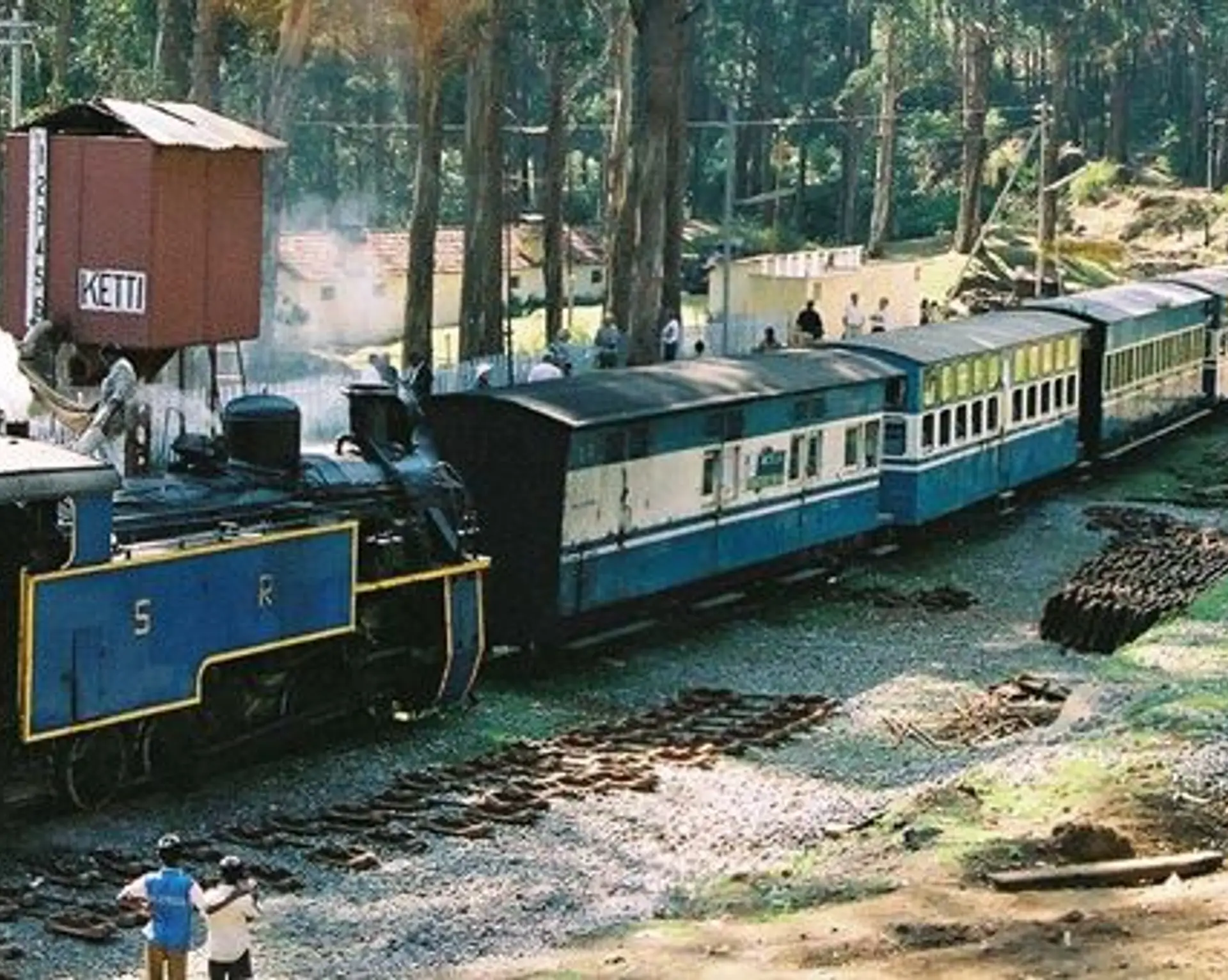 Travel in Asia - A steam engine pulling a Nilgiri Mountain Railway train in India