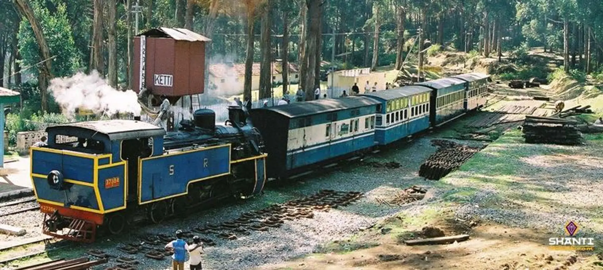 Travel in Asia - A steam engine pulling a Nilgiri Mountain Railway train in India