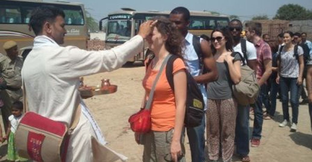 Travel in Asia - Shanti Travel team members receiving blessings in India at an Incentive Weekend retreat