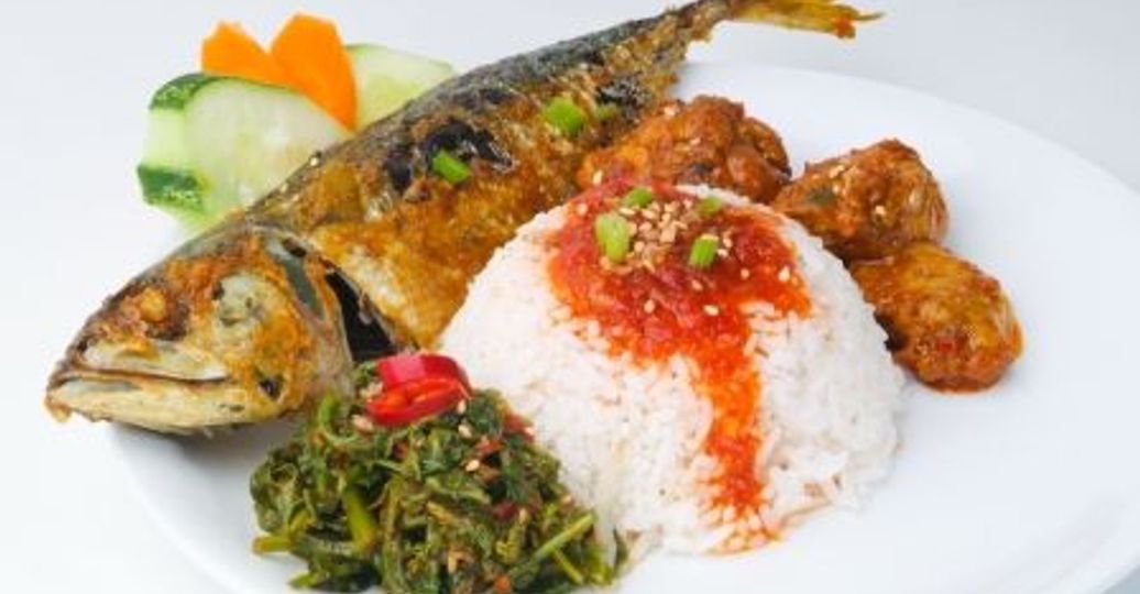 Travel in Asia - A cooked fish with rice and sides