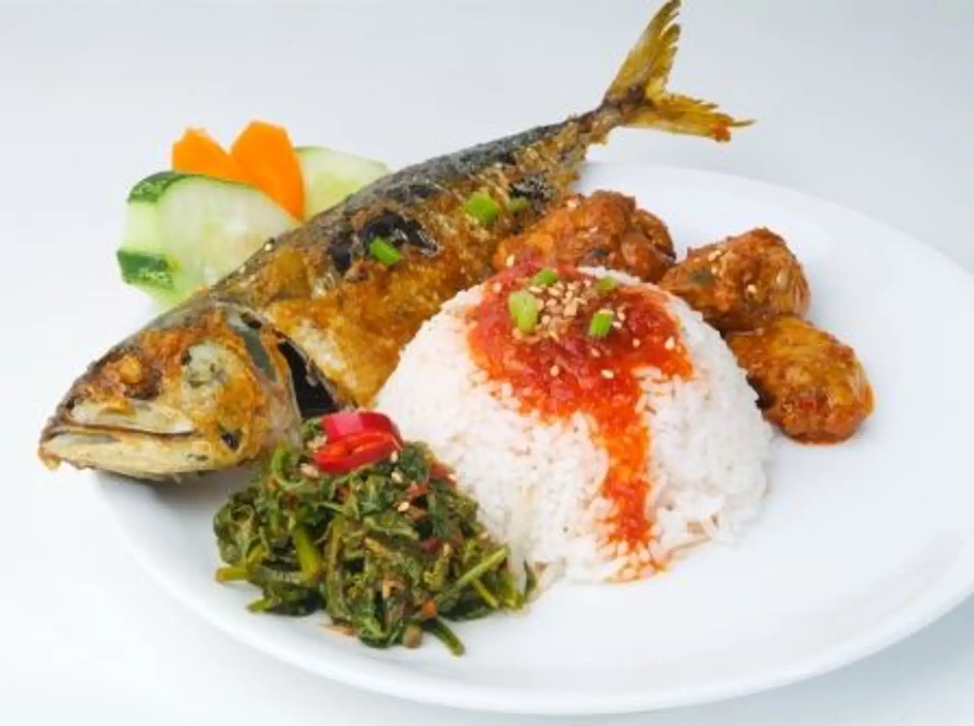 Travel in Asia - A cooked fish with rice and sides