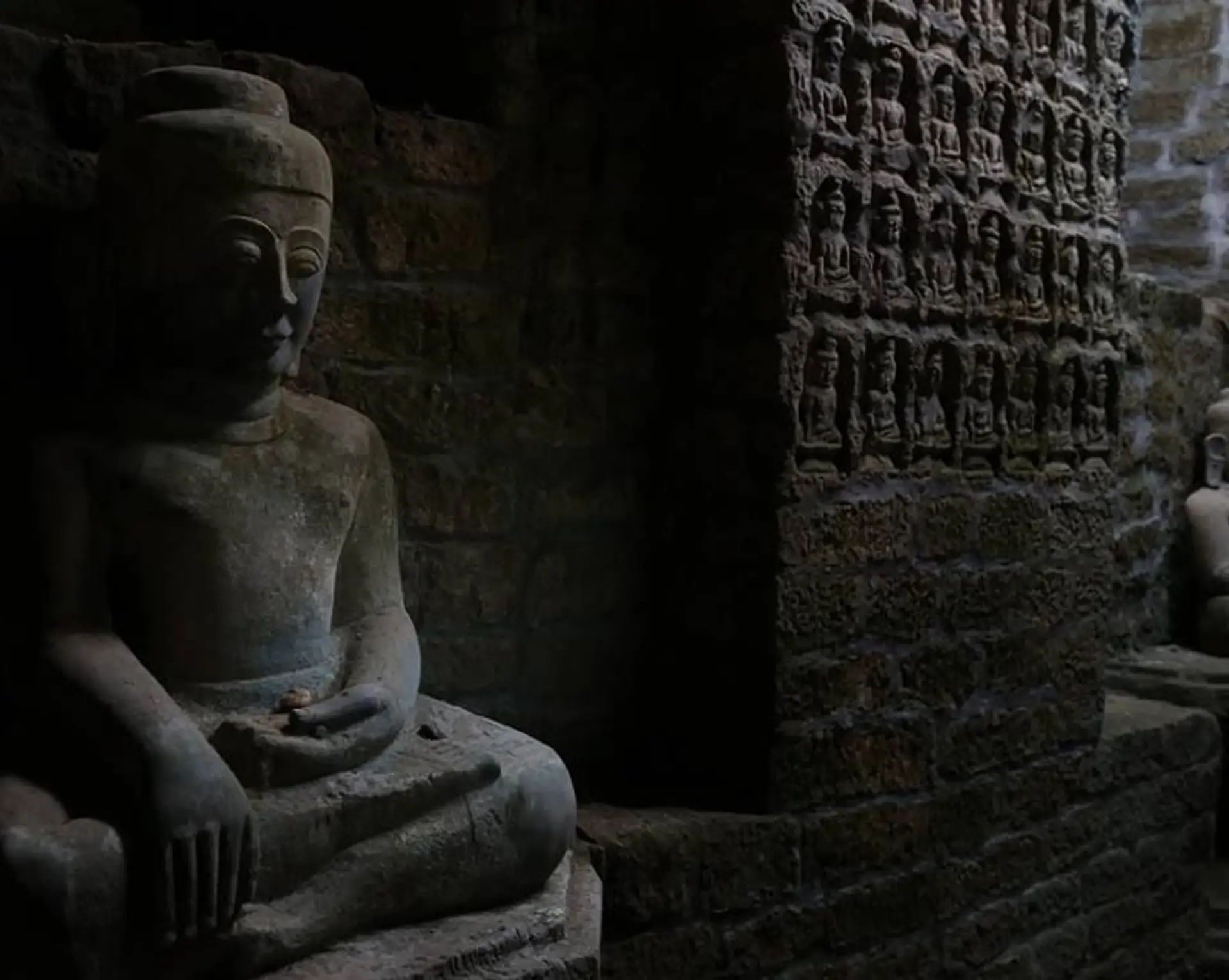 Travel in Asia - Buddha statues inside the Koe Thaung temple in Mrauk U, Myanmar