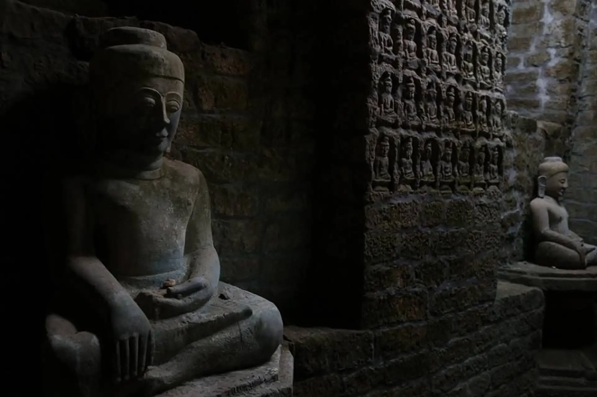 Travel in Asia - Buddha statues inside the Koe Thaung temple in Mrauk U, Myanmar