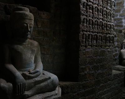 Travel in Asia - Buddha statues inside the Koe Thaung temple in Mrauk U, Myanmar