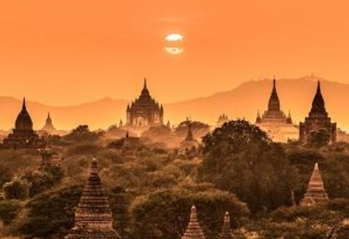 Travel in Asia - Sunset over the temple spires of the city of Bagan, Myanmar