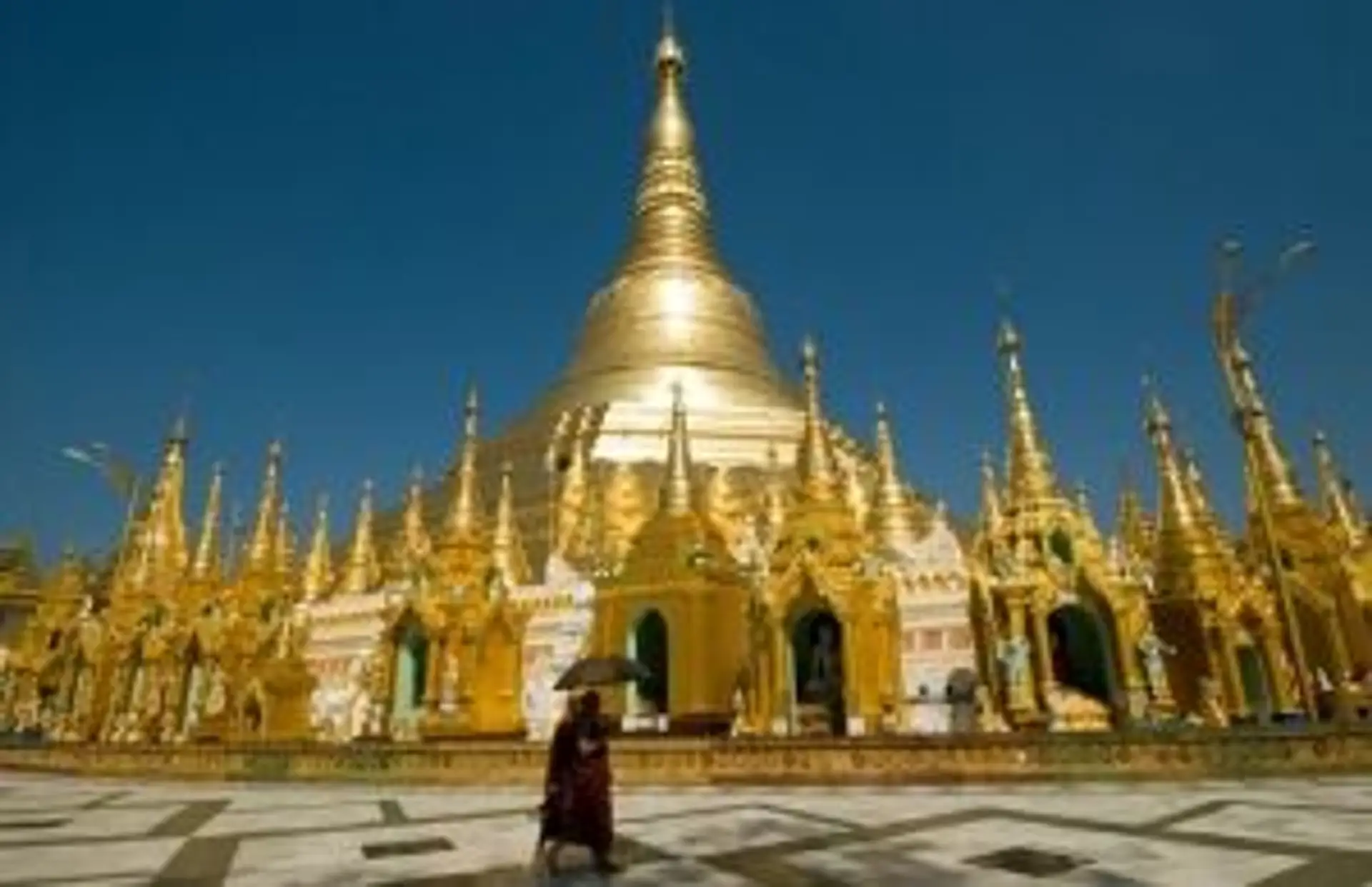 Femmes birmanes avec du Thanaka traditionnel sur le visage lors d'un voyage en Birmanie