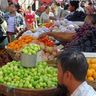 Travel in Asia - A scene from a bustling fruit market in Myanmar.