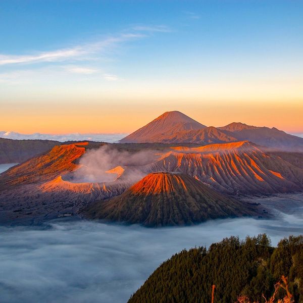Travel in Asia - An aerial view of Mount Bromo rising above a sea of clouds in East Java, Indonesia