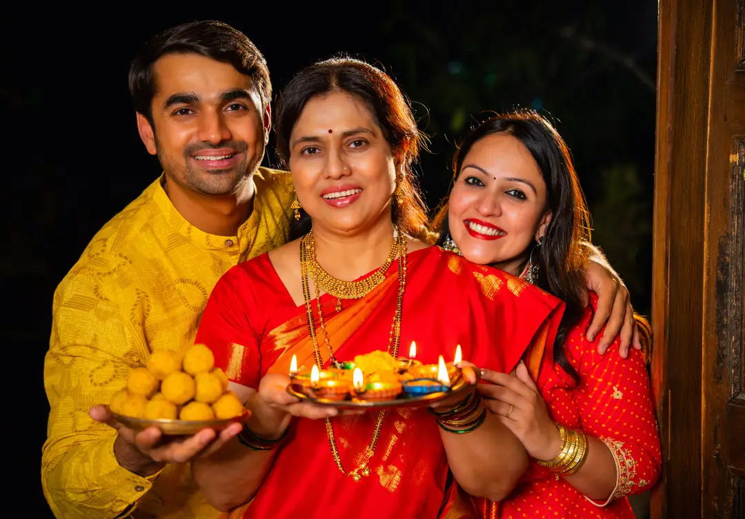 happy-indian-family-greets-with-traditional-sweets-2025-07-06-06-52-06-utc (1).jpeg