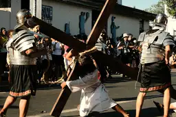 Travel in the Philippines — Dramatic religious procession depicting the Via Crucis with participants dressed as Roman soldiers and a crowd of onlookers.