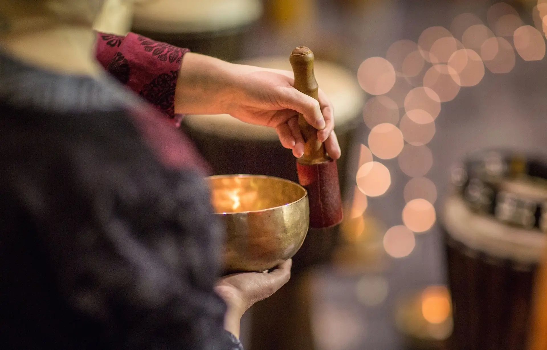 Travel in Asia - A monk playing a singing bowl in Ladakh, India