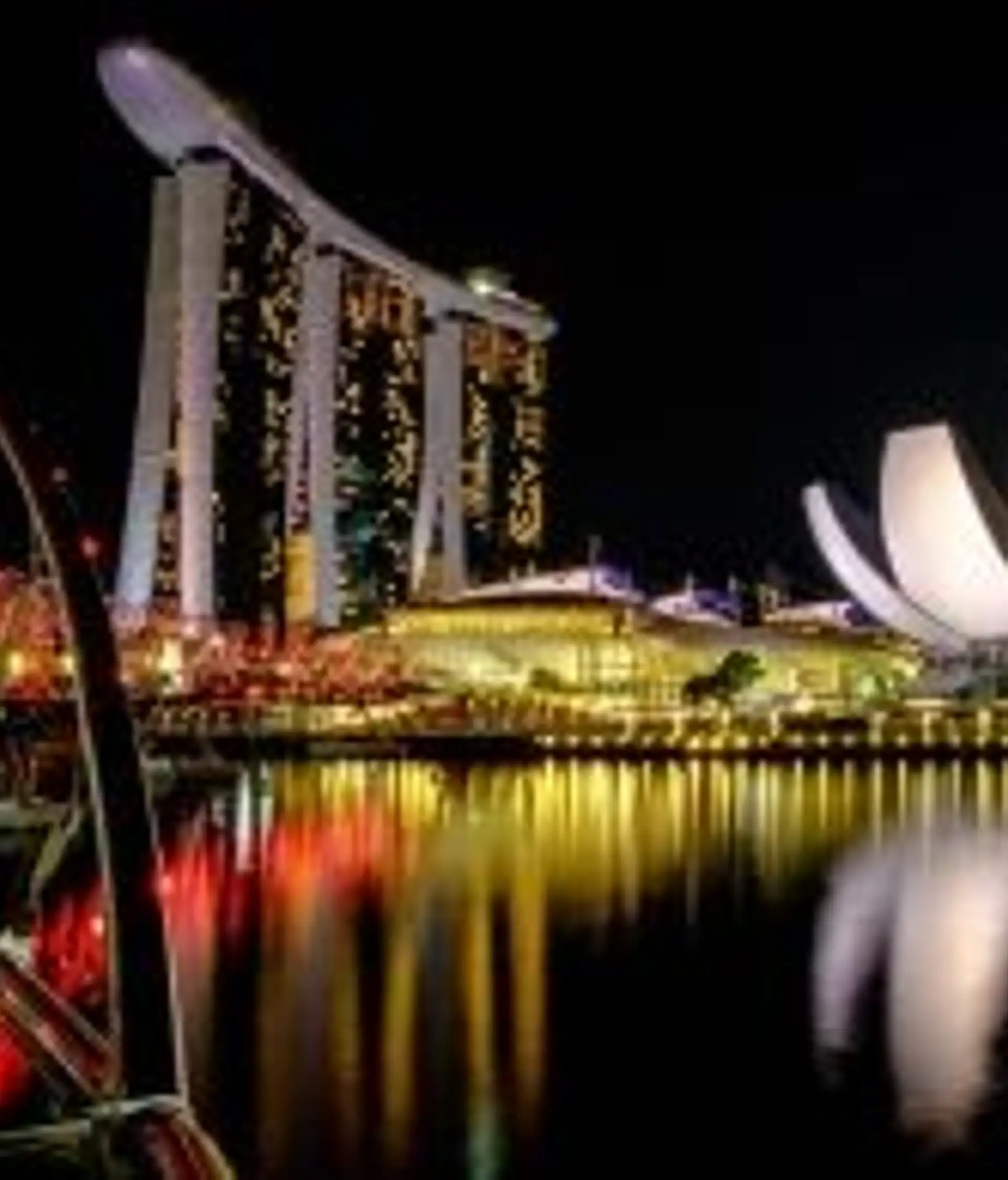 Travel in Asia - The Marina Bay Sands and ArtScience Museum illuminated at night