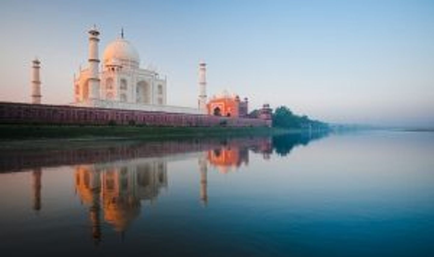 Travel in Asia - The Taj Majal seen from nearby river in morning light