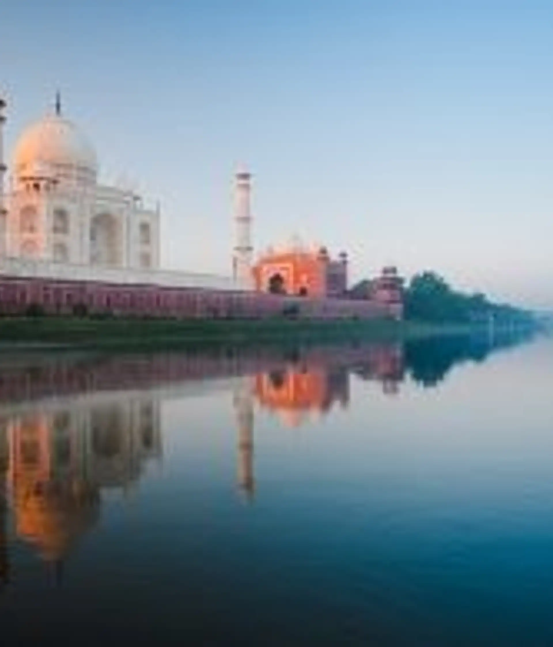 Travel in Asia - The Taj Majal seen from nearby river in morning light