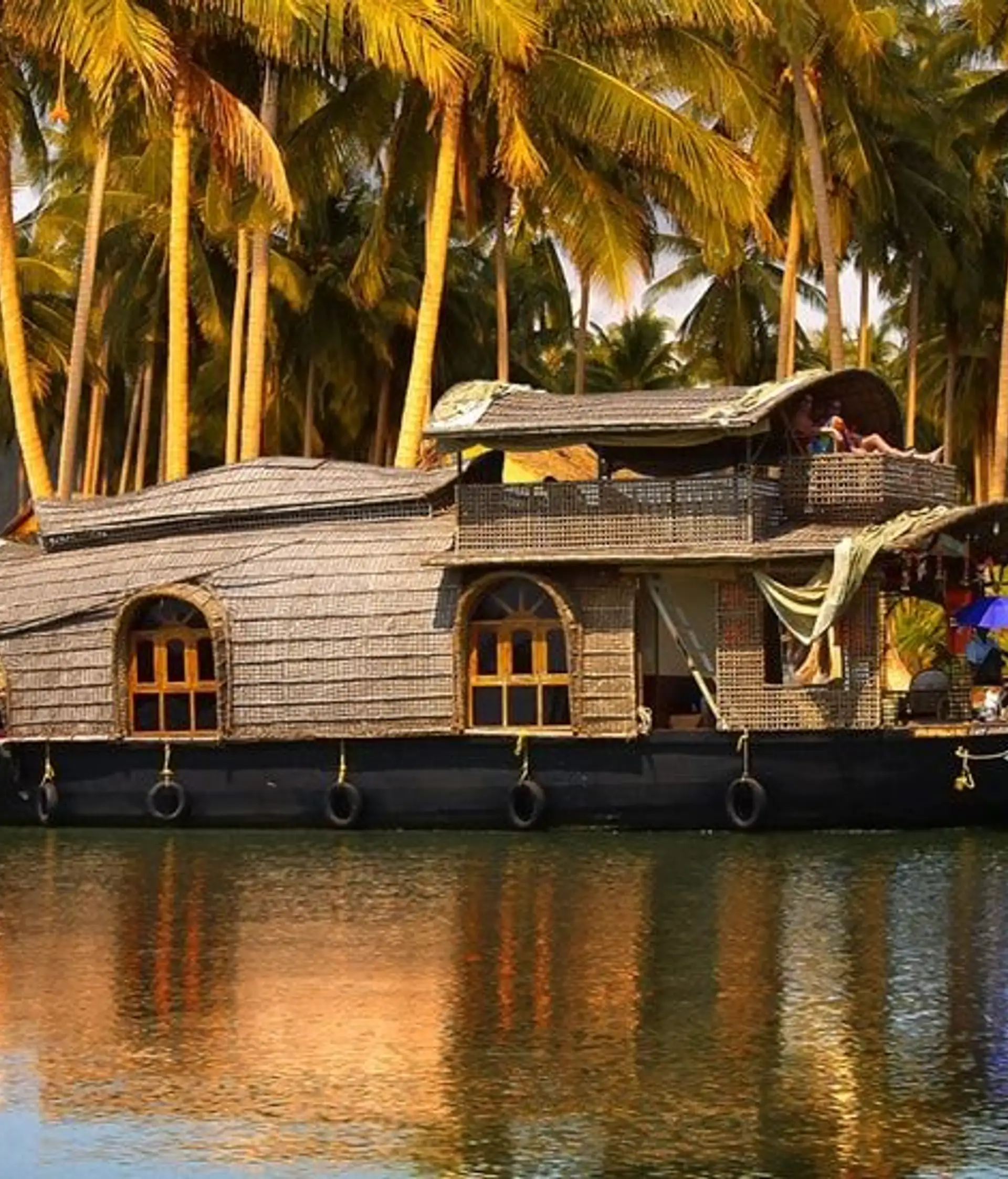 Travel in Asia - A traditional houseboat, or kettuvallam, on the backwaters of Kerala, in southern India