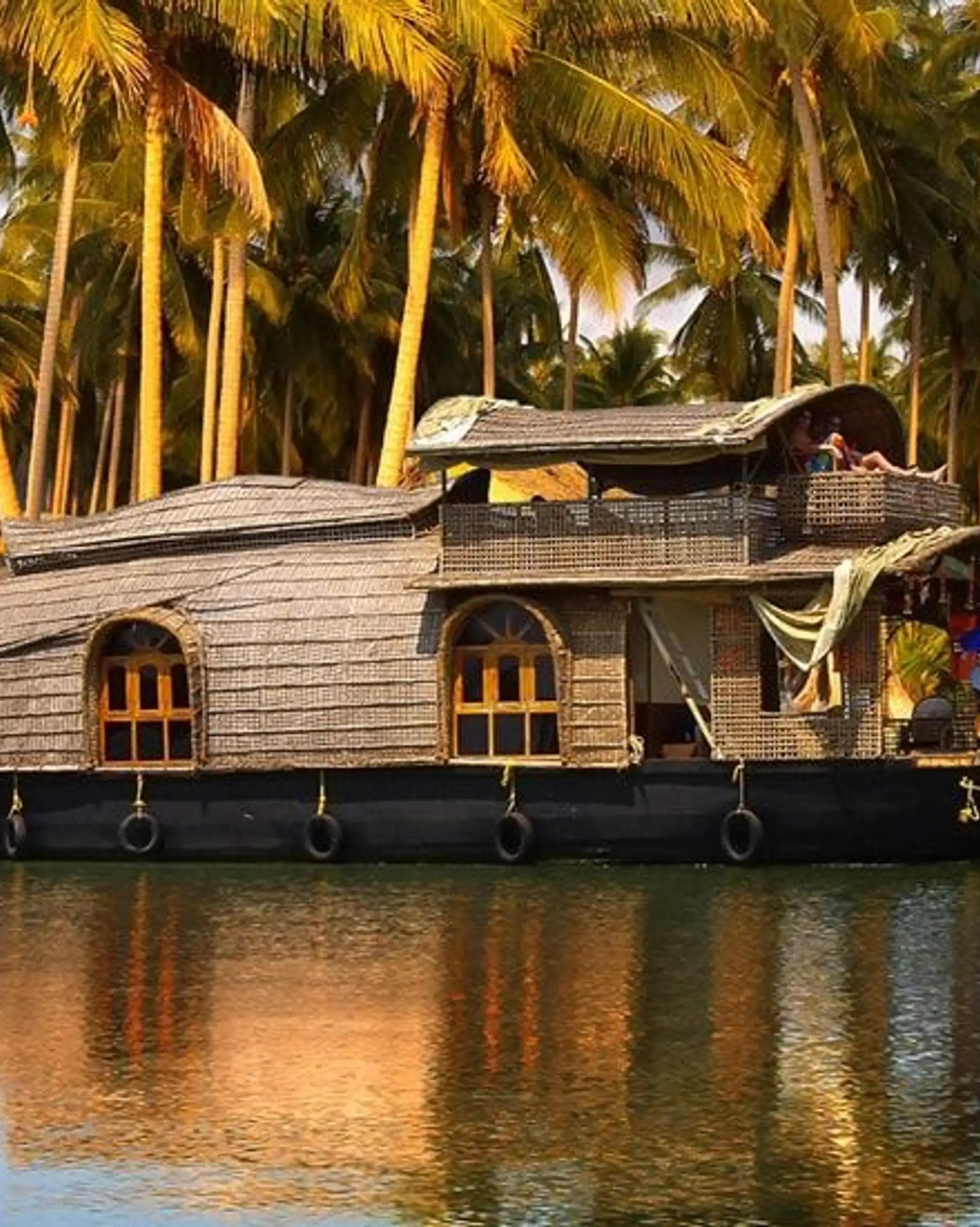 Travel in Asia - A traditional houseboat, or kettuvallam, on the backwaters of Kerala, in southern India