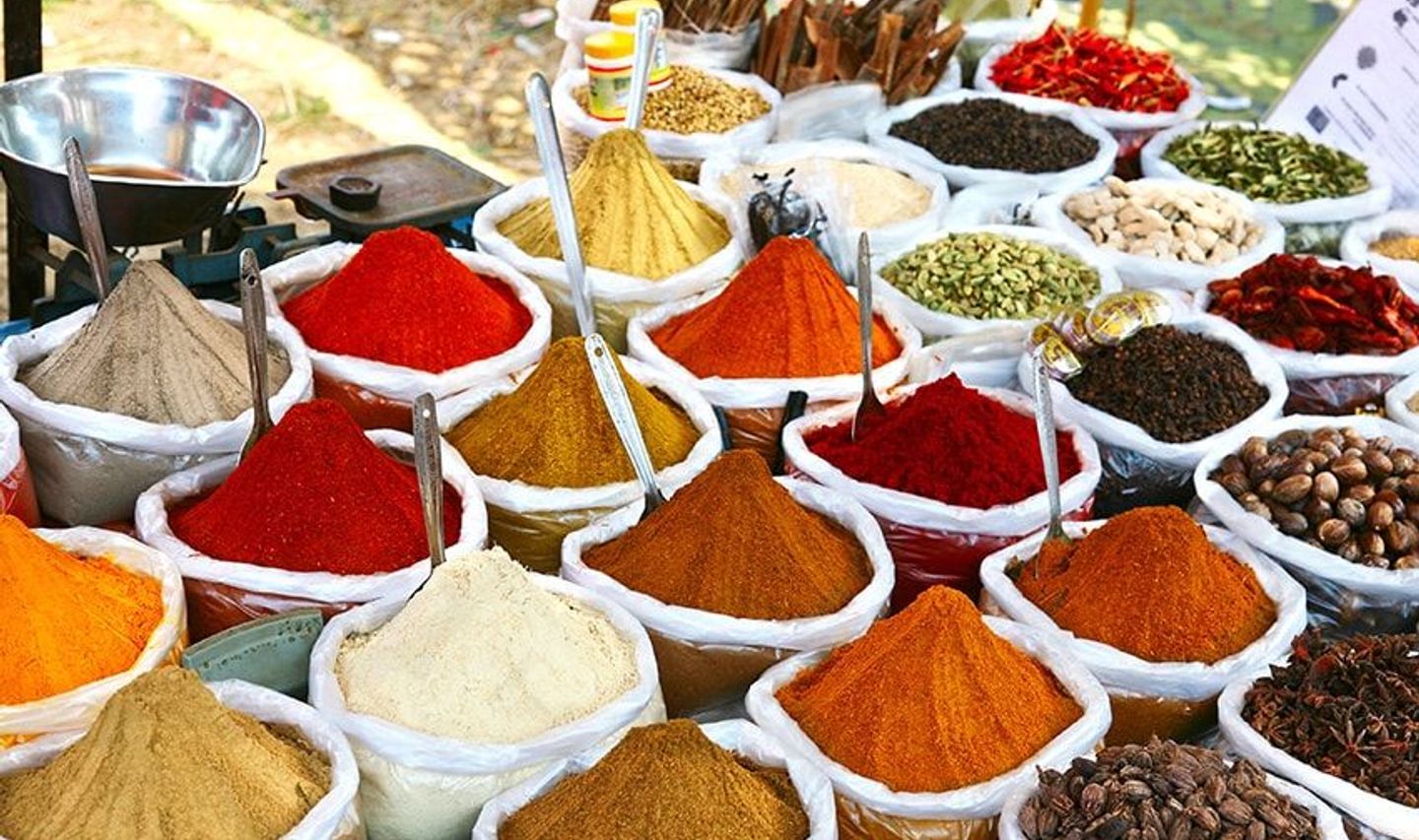 Travel in Asia - A colorful array of spices on display at a market in Kerala, India