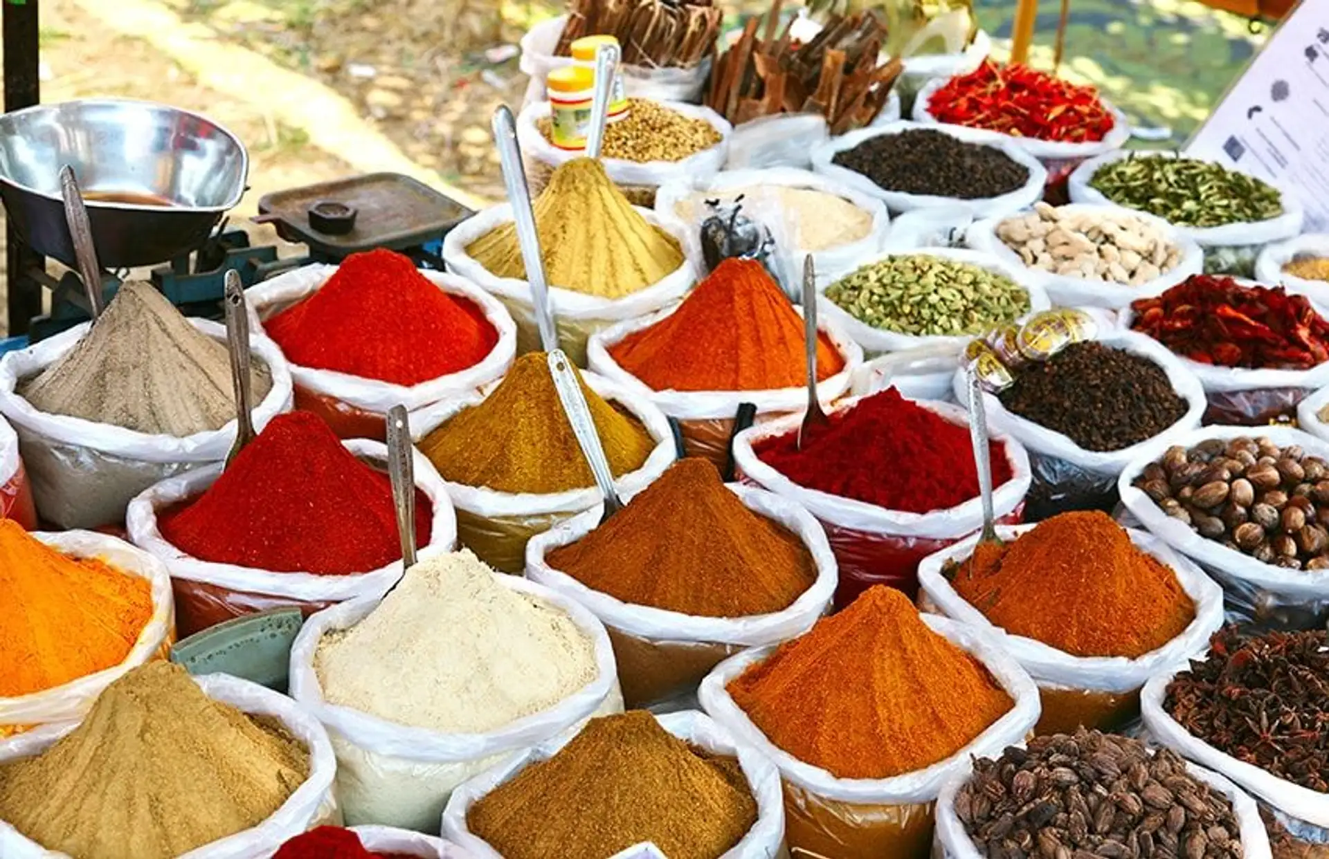 Travel in Asia - A colorful array of spices on display at a market in Kerala, India
