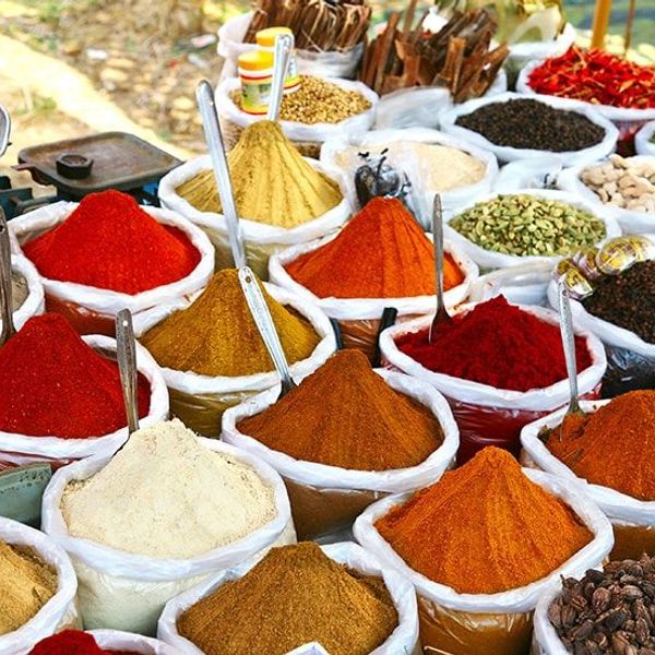 Travel in Asia - A colorful array of spices on display at a market in Kerala, India