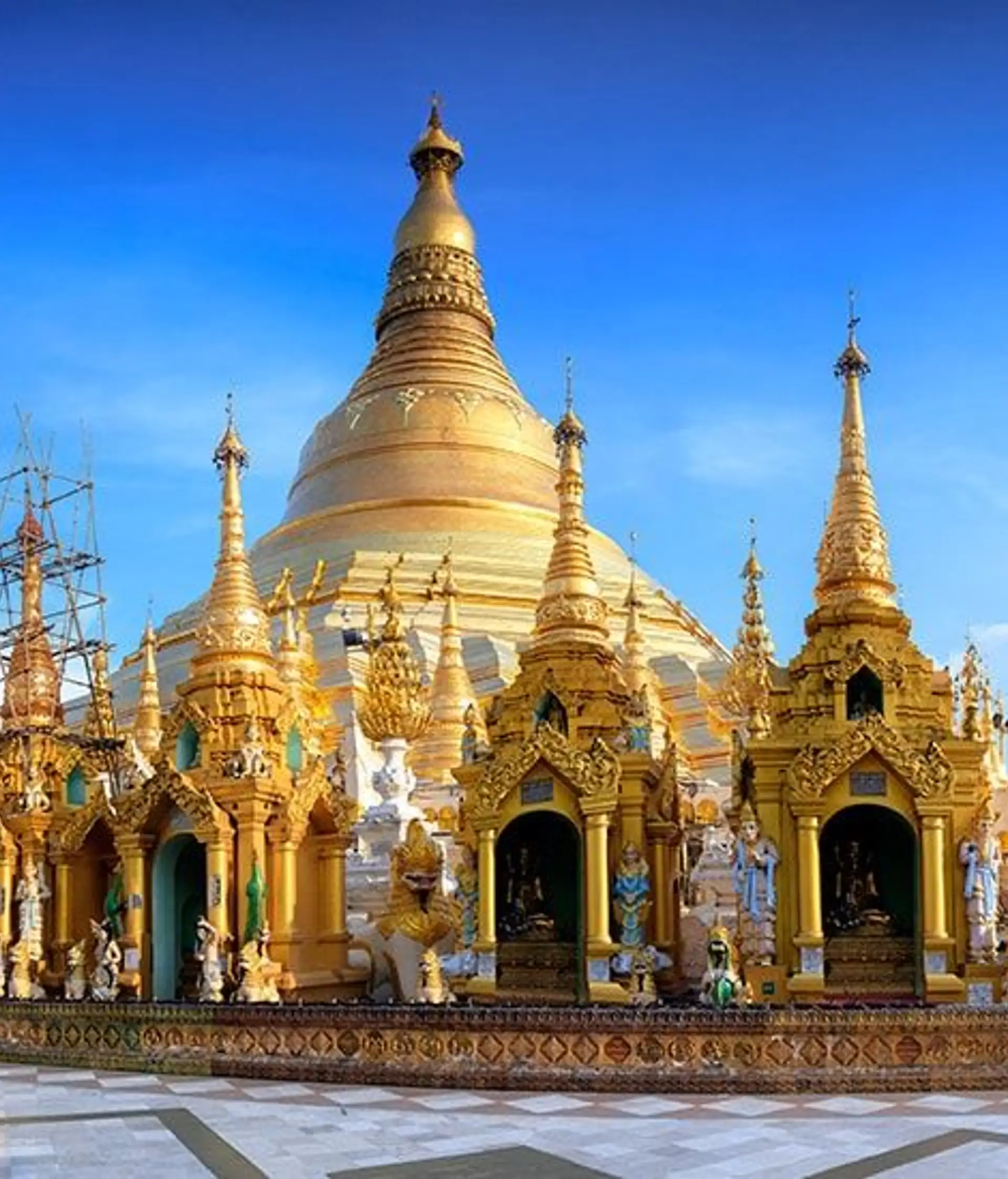 Travel in Asia - The golden-domed Shwedagon Pagoda on a sunny day in Yangon, Myanmar