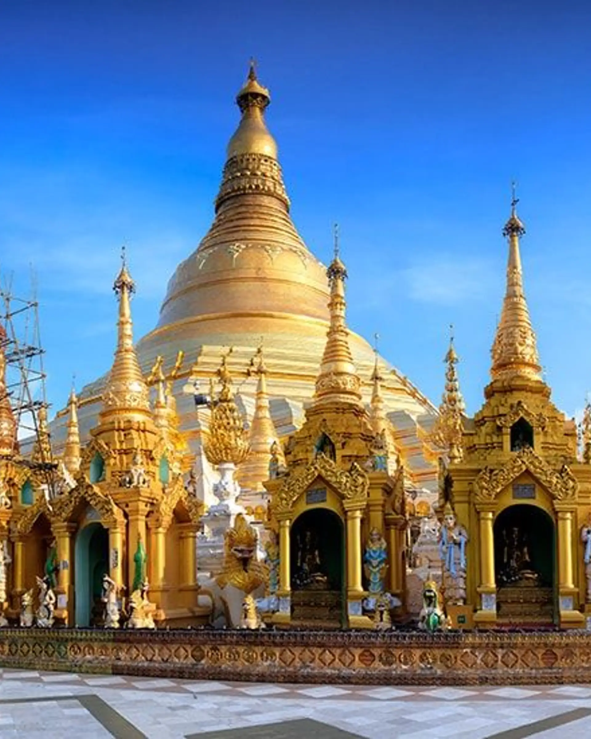 Travel in Asia - The golden-domed Shwedagon Pagoda on a sunny day in Yangon, Myanmar