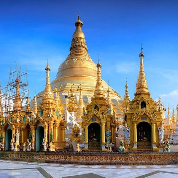 Travel in Asia - The golden-domed Shwedagon Pagoda on a sunny day in Yangon, Myanmar