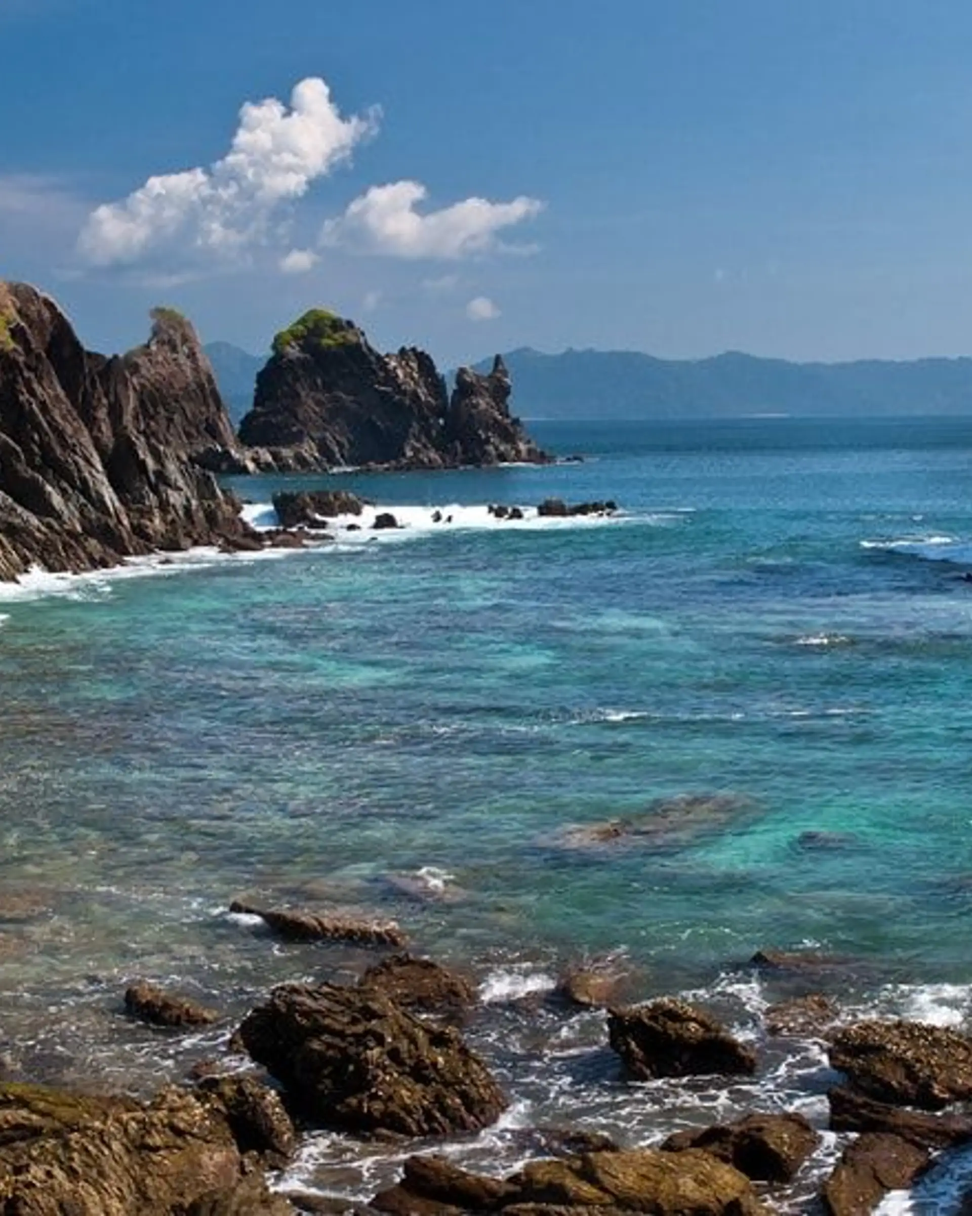 Travel in Asia - A rocky beach on a sunny day on an island in the Mergui Archipelago in Myanmar (Burma)