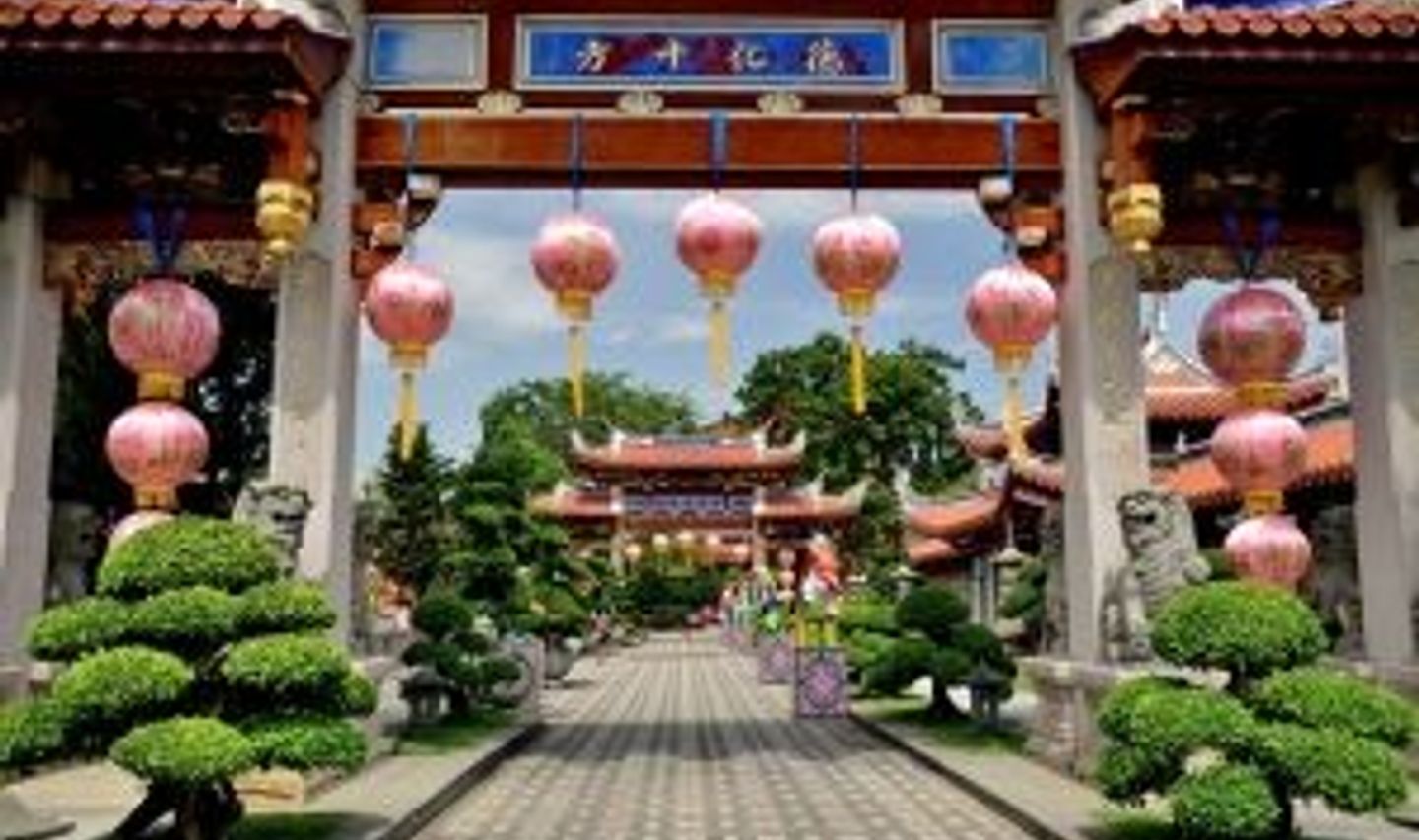 Travel in Asia - Singapore's Lian Shan Shuang Lin Monastery with lanterns hanging from its gate