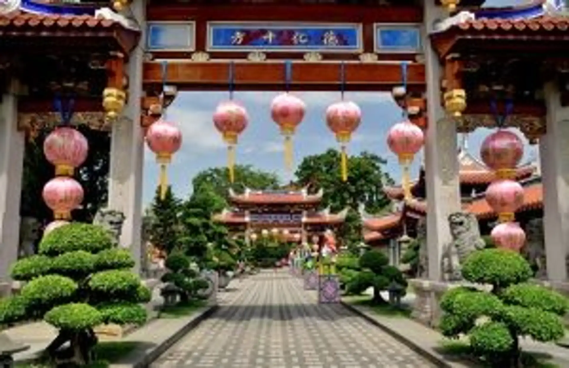 Travel in Asia - Singapore's Lian Shan Shuang Lin Monastery with lanterns hanging from its gate